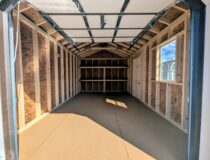 10x16 Peak Front Interior with Shelves