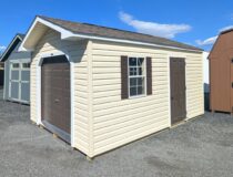 10x16 Peak Front Sunny Maize Vinyl Siding White Trim Dark Brown Shutters and Rustic Slate Shingles