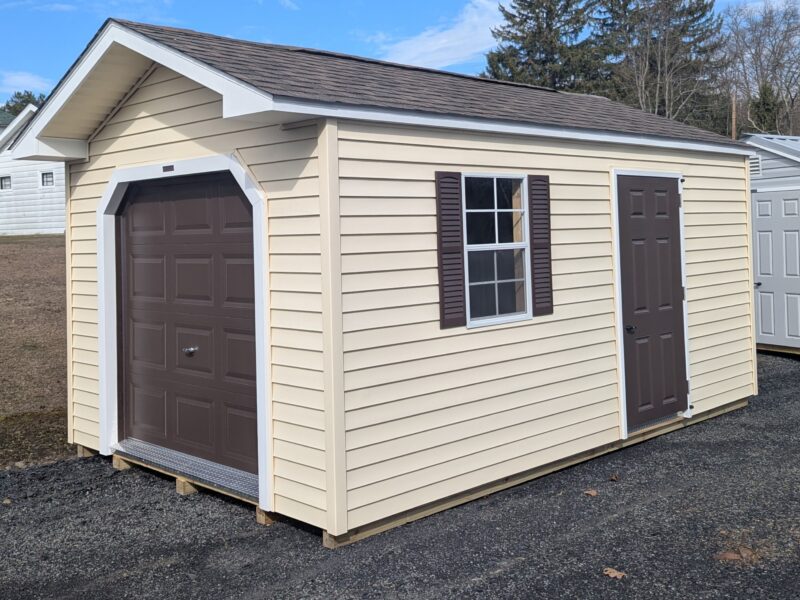 10x16 Peak Front Sunny Maize Straight Lap Vinyl Siding White Trim Dark Brown Shutters and Rustic Slate Shingles