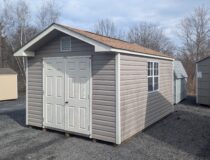 10x14 Peak Front Shed with Pebble Caly Vinyl Siding Classic Sand Trim Rustic Cedar Shingles