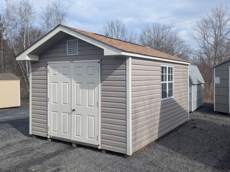 10x14 Peak Front Shed with Pebble Caly Vinyl Siding Classic Sand Trim Rustic Cedar Shingles