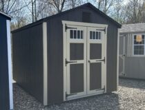 8x12 Madison Peak Shed with Ebony Polyurethane stain and Beige trim.