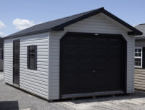 12x20 Peak Harbor Stone Vinyl Garage with closed garage door