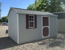10x14 Madison Peak storage shed in light grey with red shutters and door at Pine Creek Structures in Berlin CT