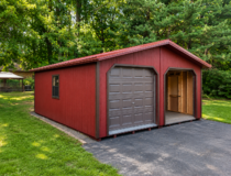 Side view of 20x24 peak modular with single entry door and windows