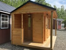 8x12 outdoor sauna with traditional gable roof on a backyard property