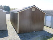 12x24 Peak Garage with Coffee Polyuretane siding, Beige trim and shutters, and Burnished Slate metal roof