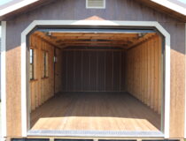 12x24 Peak Garage with Coffee Polyuretane siding, Beige trim and shutters, and Burnished Slate metal roof