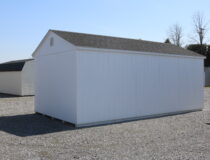 12x22 HD Peak with White siding, White trim, Black shutters, and Rustic Black shingles