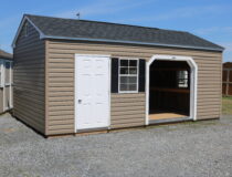 12x20 HD Peak with Java vinyl siding, White trim, Black shutters, and Rustic Black shingles