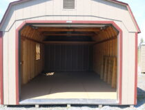 12x24 Dutch Garage with PC Clay siding, Red trim and shutters, and Natural Trimber shingles