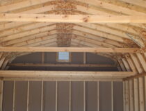12x24 Dutch Garage with PC Clay siding, Red trim and shutters, and Natural Trimber shingles