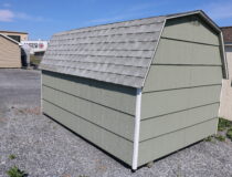 8×12 Mini Barn Cut Lap with PC Green siding, White trim, and Fox Hollow Gray shingles