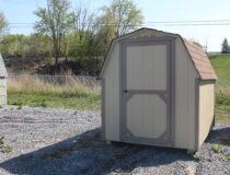 6x8 Madison Mini Barn with Beige siding, PC Clay trim, and Rustic Cedar shingles