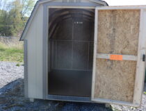 6x8 Madison Mini Barn with Beige siding, PC Clay trim, and Rustic Cedar shingles