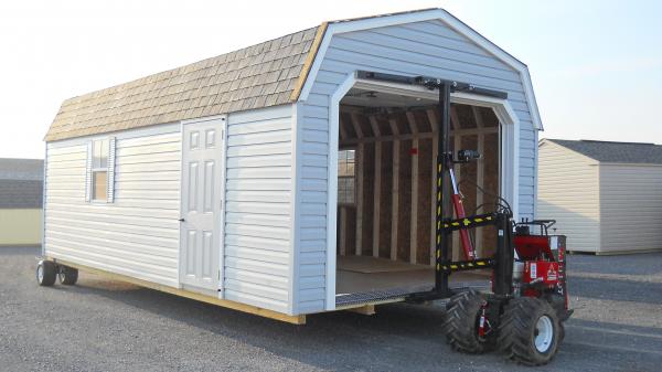 Portable Garage being moved with the Shed Mule