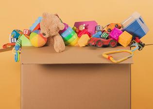 box of baby and toddler toys