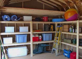 Storing a items in a shed with a loft and shelves
