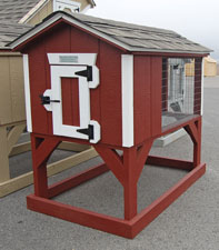 Red and White rabbit hutch back animal shelter constructed by Pine Creek Structures