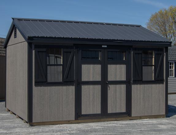 10x14 Peak Storage Shed with New England Package (wide trim, transom windows, etc), driftwood grey LP siding, black trim, and black metal roofing