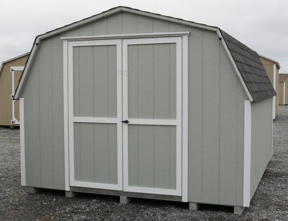 Pine Creek 10x12 HD Mini Barn with Light Gray walls, White trim and White shutters, and Charcoal shingles