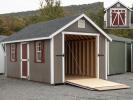 10x20 Cape Cod Storage Shed with Rampage Door shown open and closed