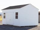 Custom Front Entry Peak Shed with White Vinyl Siding from Pine Creek Structures