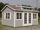 12x16 Custom Storage Shed with french doors, extra windows, and a roof dormer with windows