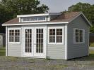 12x16 Custom Storage Shed with french doors, extra windows, and a roof dormer with windows
