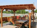 Pine Creek 12x12 Pergola with Redwood stain, and privacy lattice top